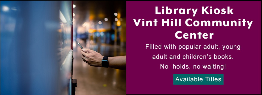 Hand holding mobile device at kiosk. Library Kiosk at Vint Hill Community Center, filled with popular adult and children's books. No holds, no waiting! Click here for available titles.