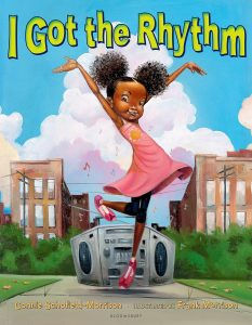 Young girl dancing in front of a boombox, reading "I Got the Rhythm"